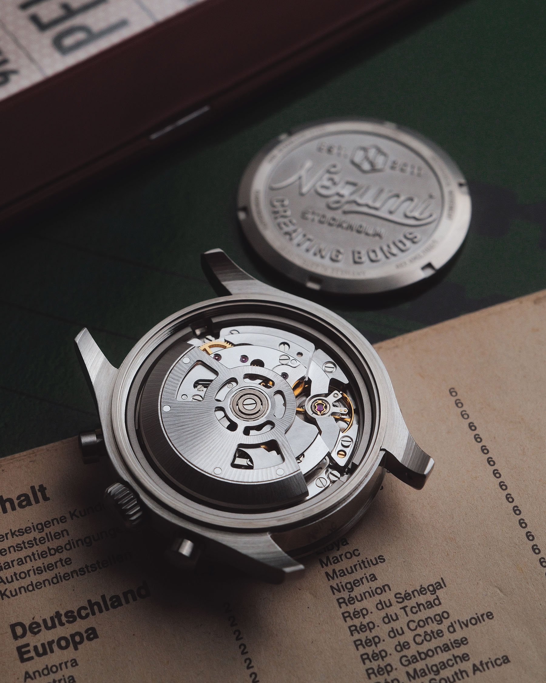 Nezume Voiture VM2.1102 watch head with case back removed, showing movement