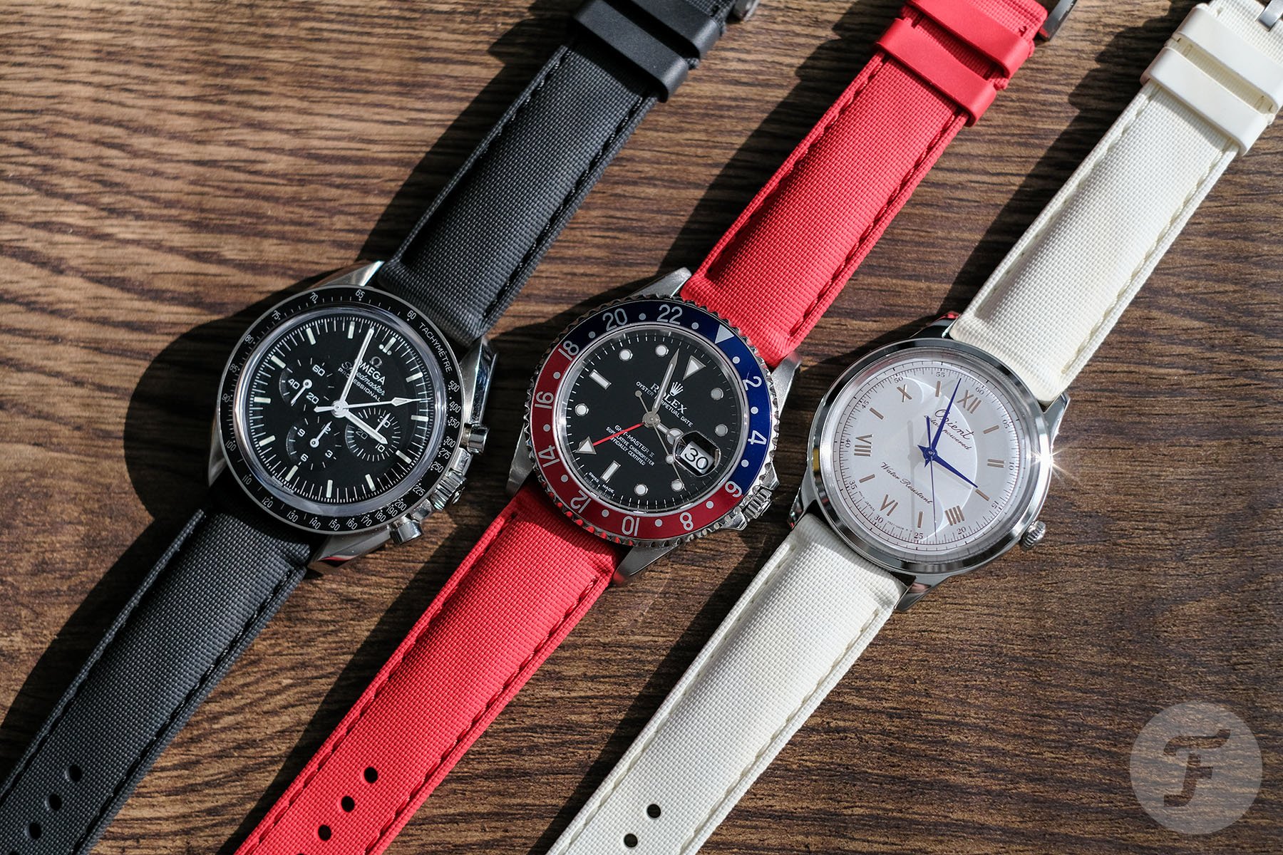 Omega Speedmaster Moonwatch, Rolex GMT-Master II, and Orient Bambino 38 Solar-Power 75th Anniversary Edition on Artem Classic Hydroflex V2 straps