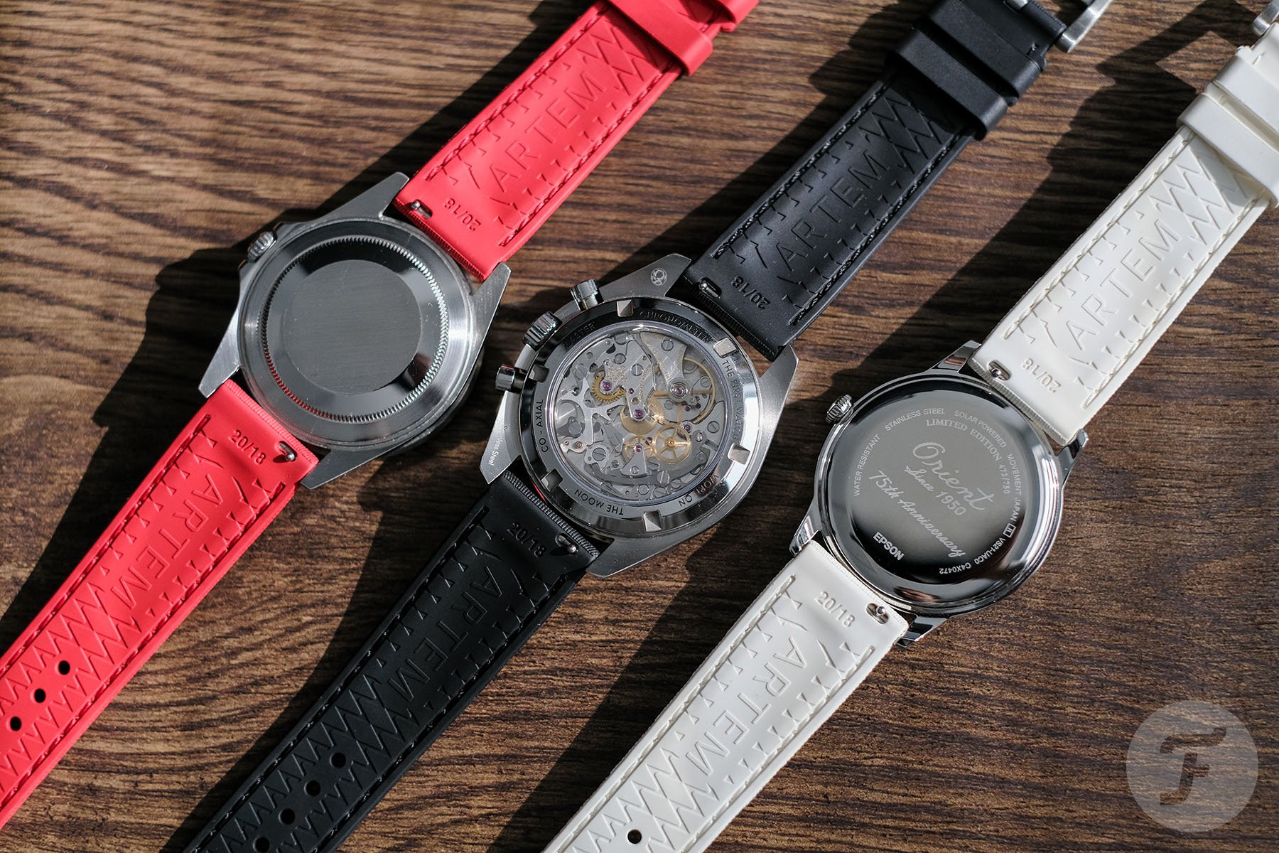 three watches face down with Artem Classic Hydroflex V2 straps