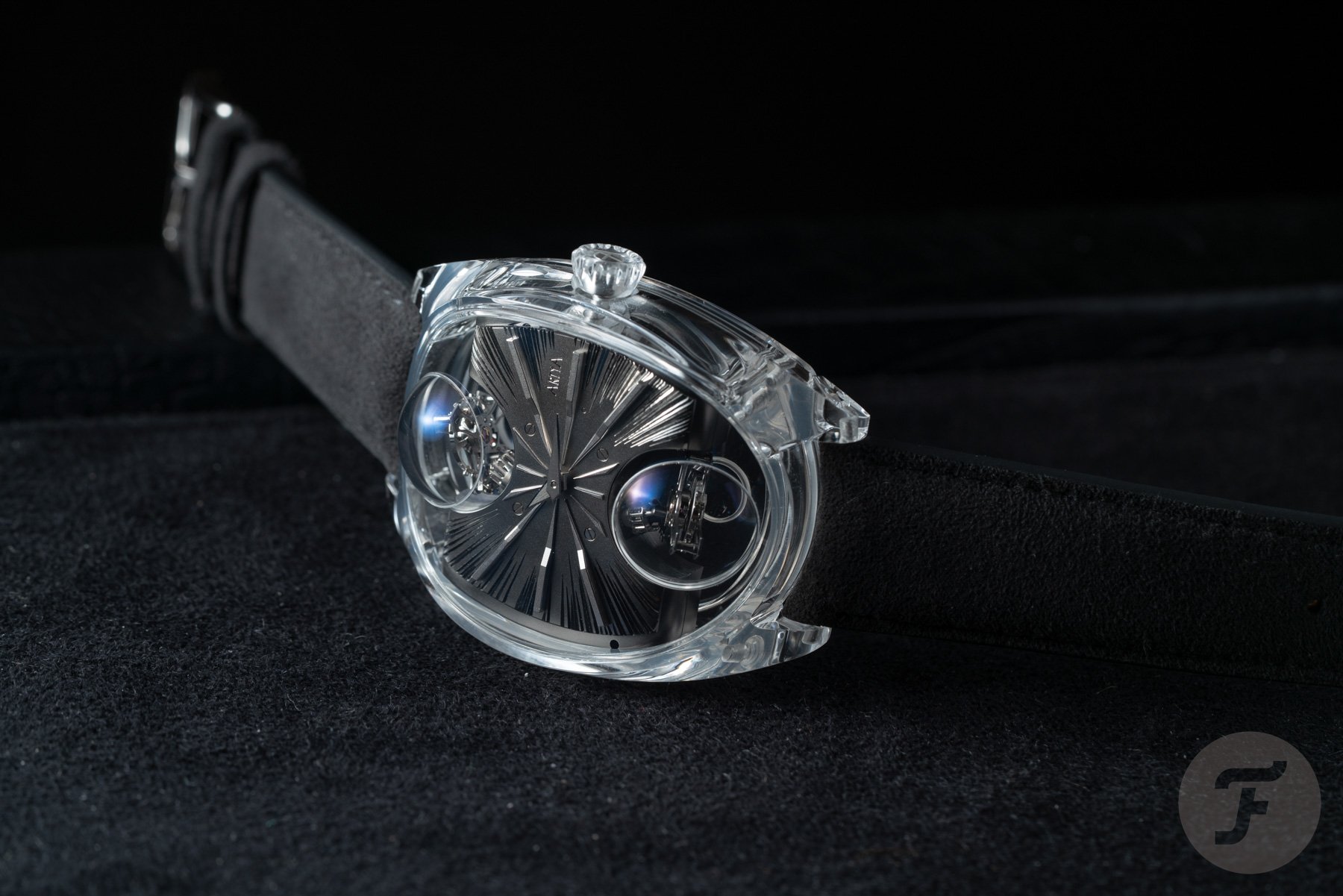 ArtyA Complexity Métiers d'Art on its side, crown up, against black background