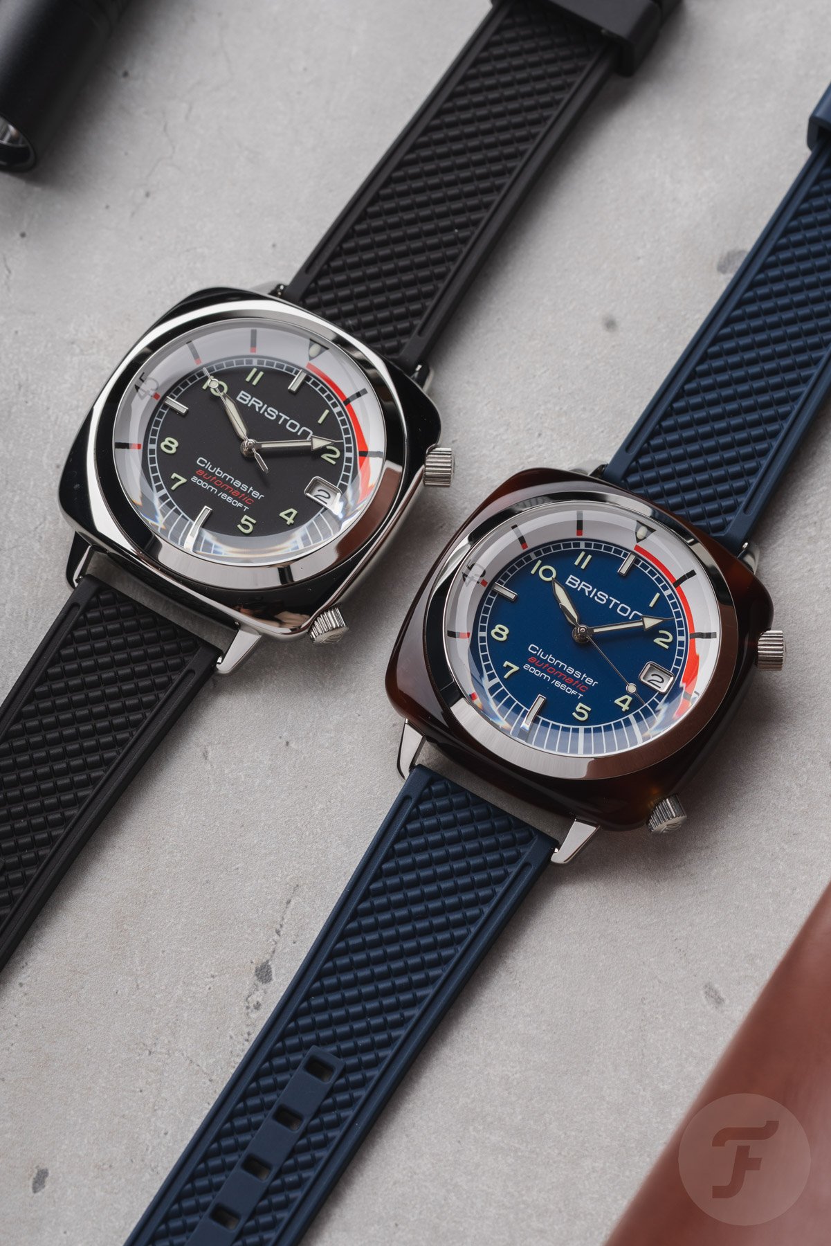 all-steel and acetate Briston Clubmaster Legend Compressor models side by side, flat-lay