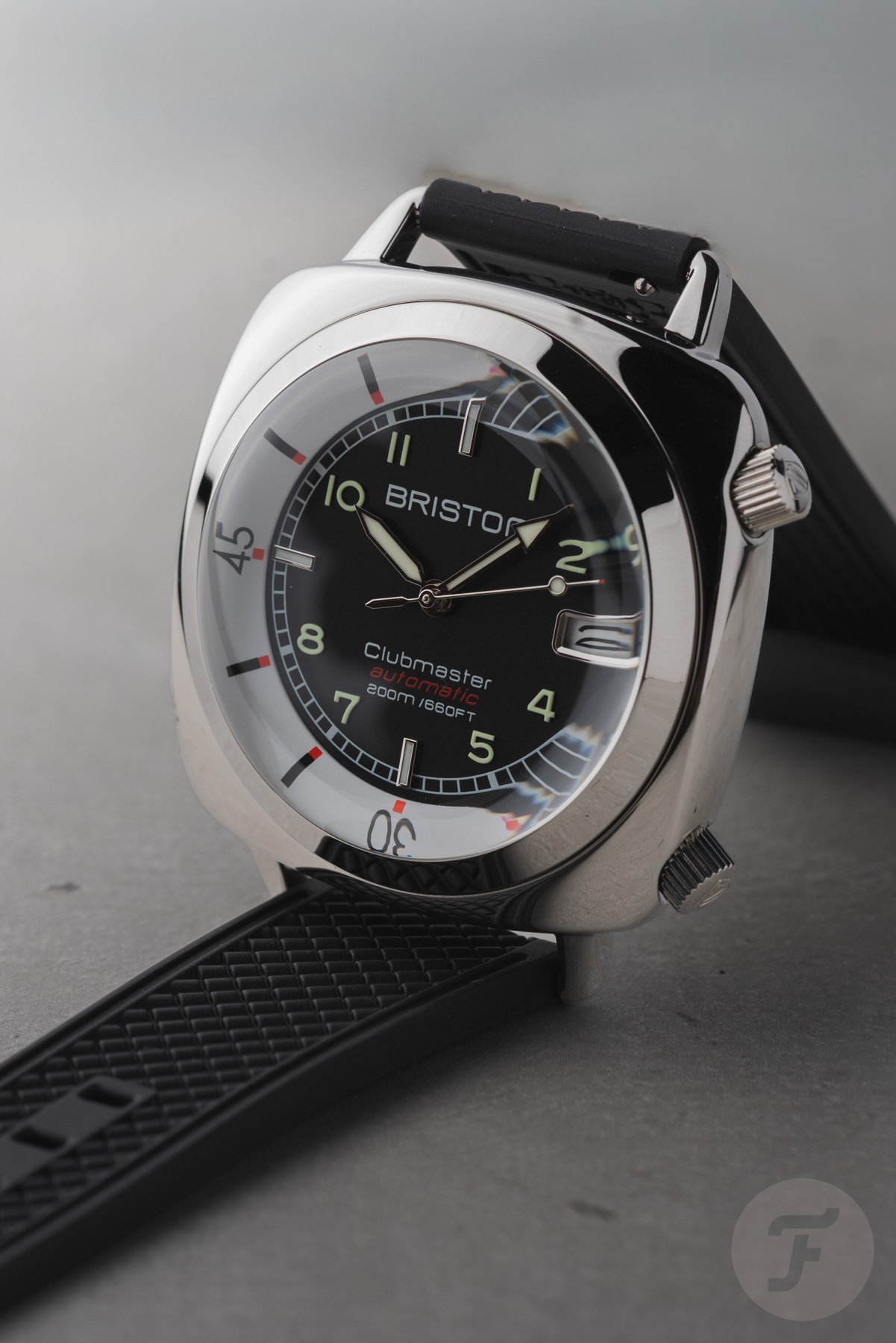 steel Briston Clubmaster Legend Compressor propped up with strap
