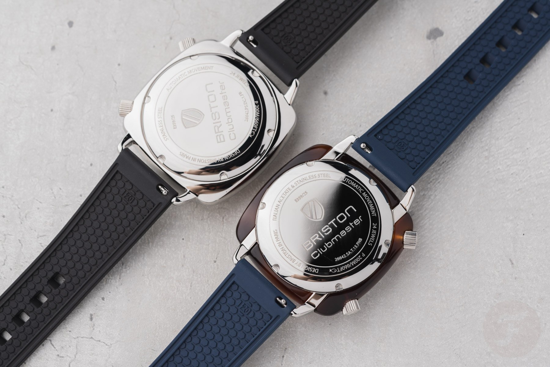 Briston Clubmaster Legend Compressor all-steel and acetate models face down, side by side