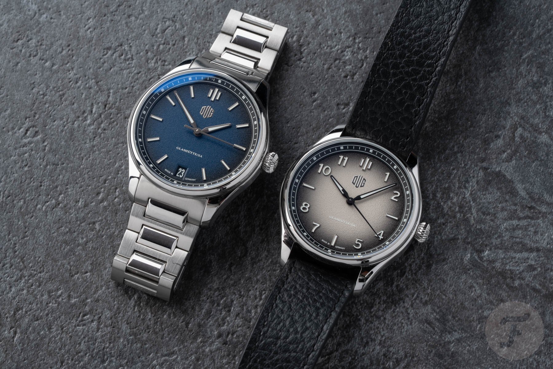 blue-dial DUG Purist Typ 1 and gray-dial Typ 2 side by side