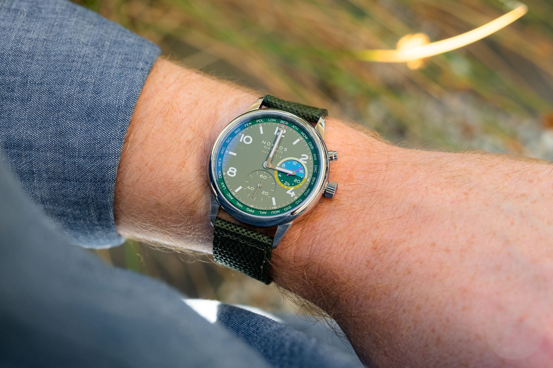 Nomos Club Sport Neomatik Worldtimer Jungle wrist shot