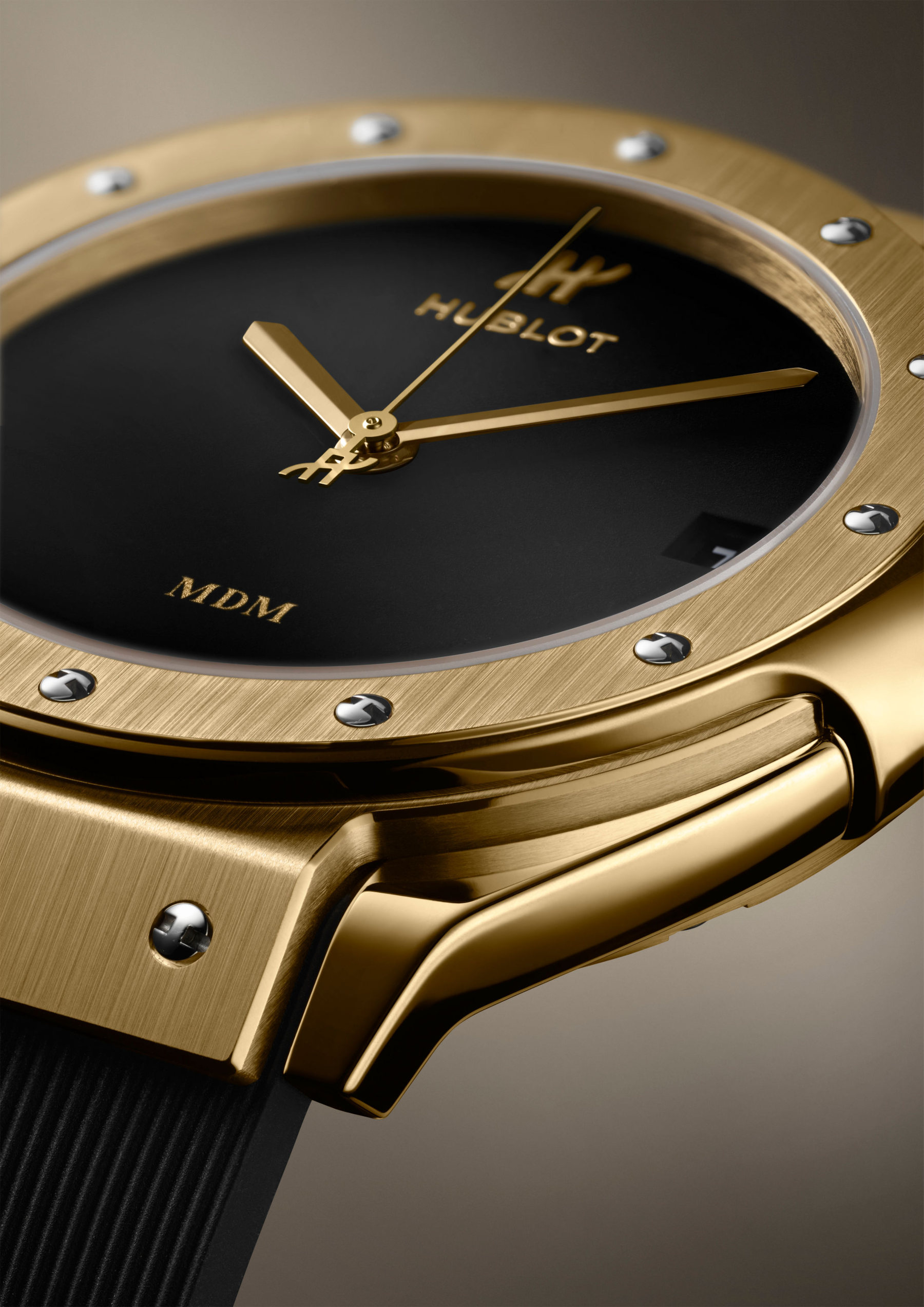 yellow gold Hublot Classic Fusion Tributo lug, bezel, and dial