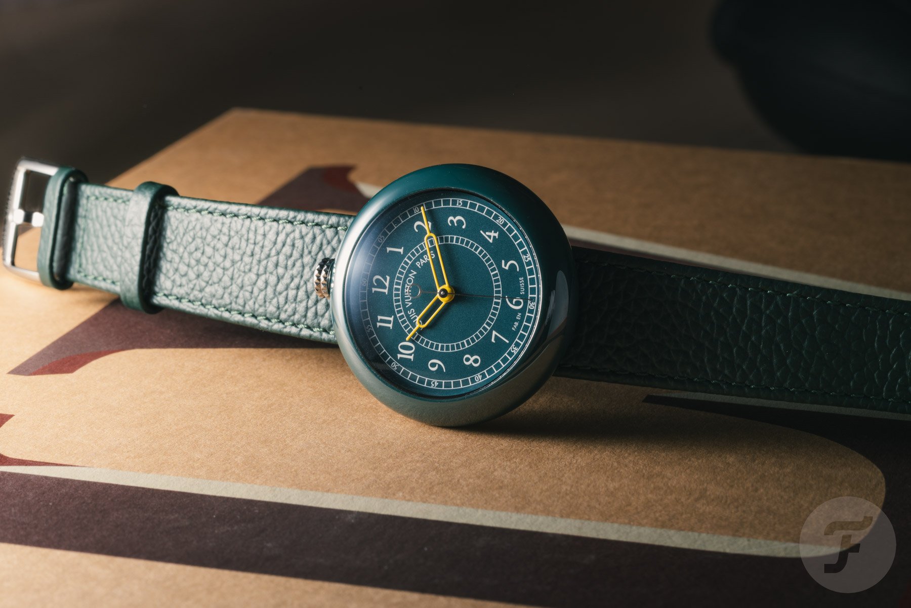 green ceramic Louis Vuitton Monterey on its side