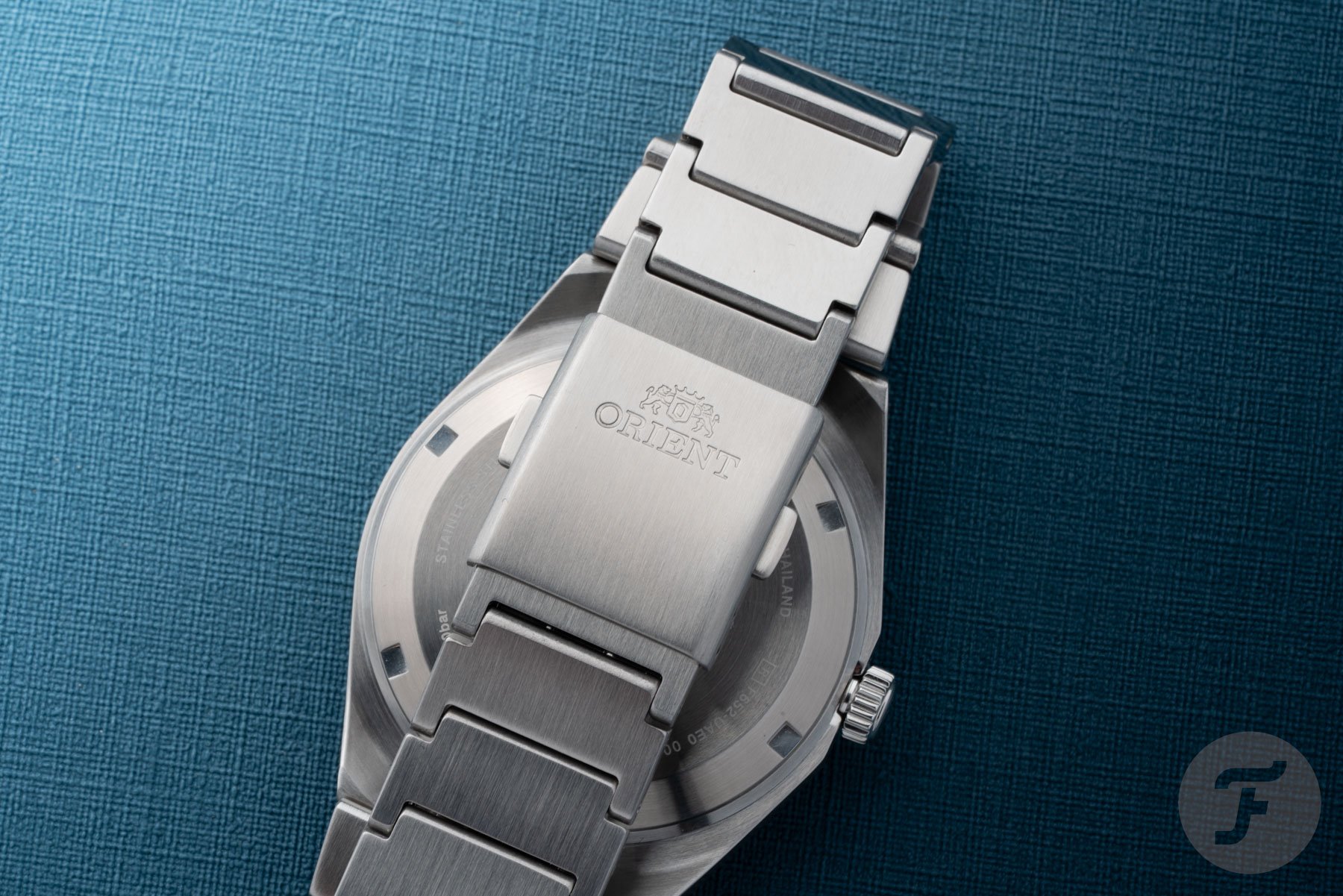 Orient Flusso RA-BB0203L face down, clasp closed
