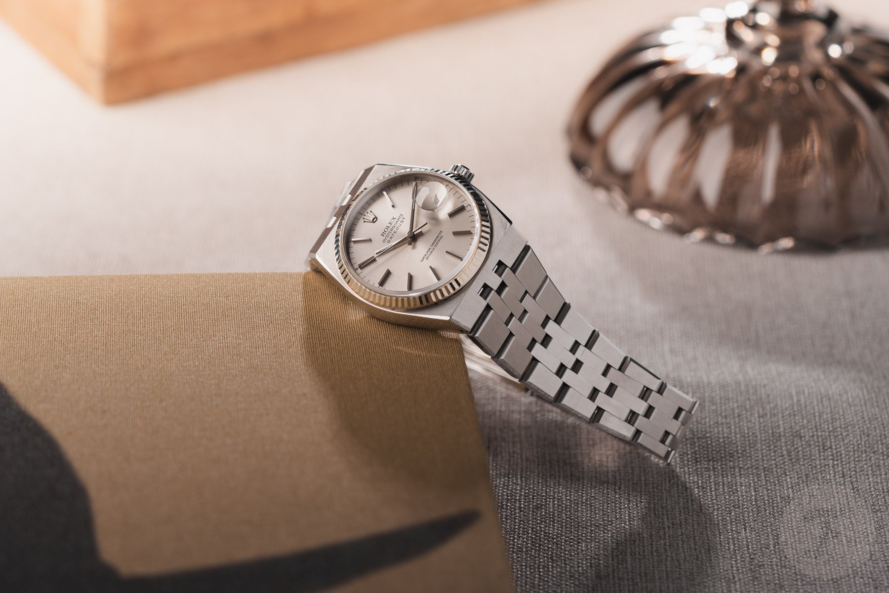 Rolex Oysterquartz Datejust ref. 17000 hanging off of box corner