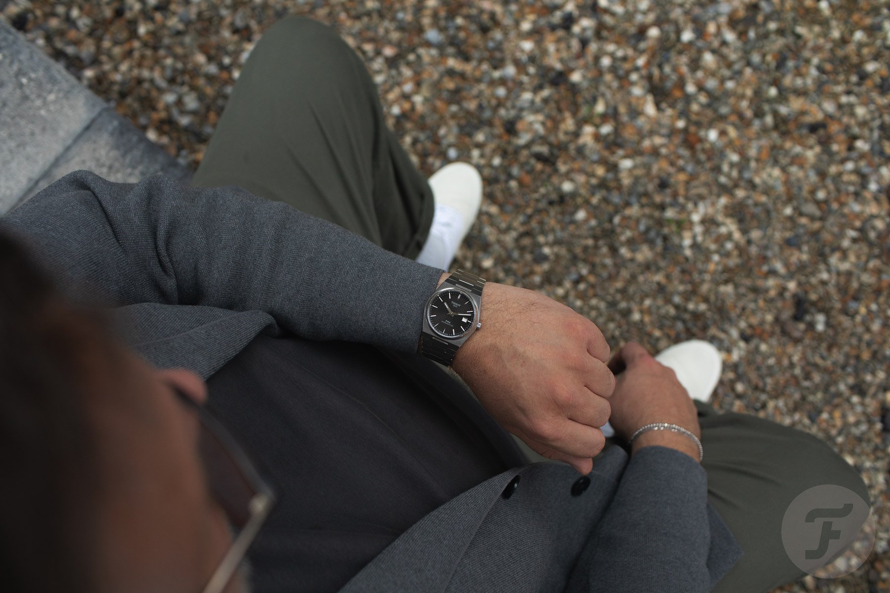 Tissot PRX T137.407.11.051.00 on wrist, overhead shot