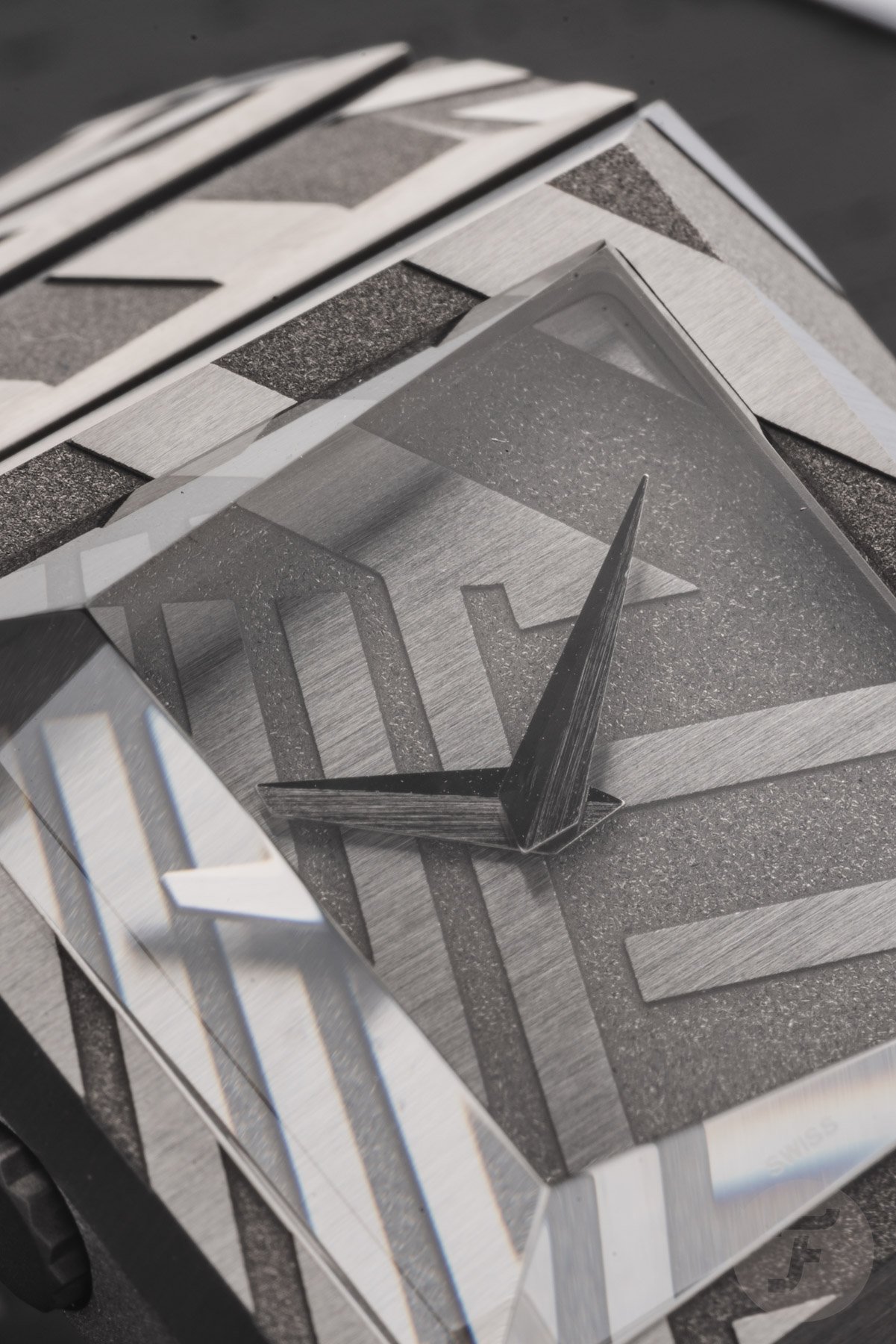 Toledano & Chan B/1 Dazzle dial, hands, and crystal up close