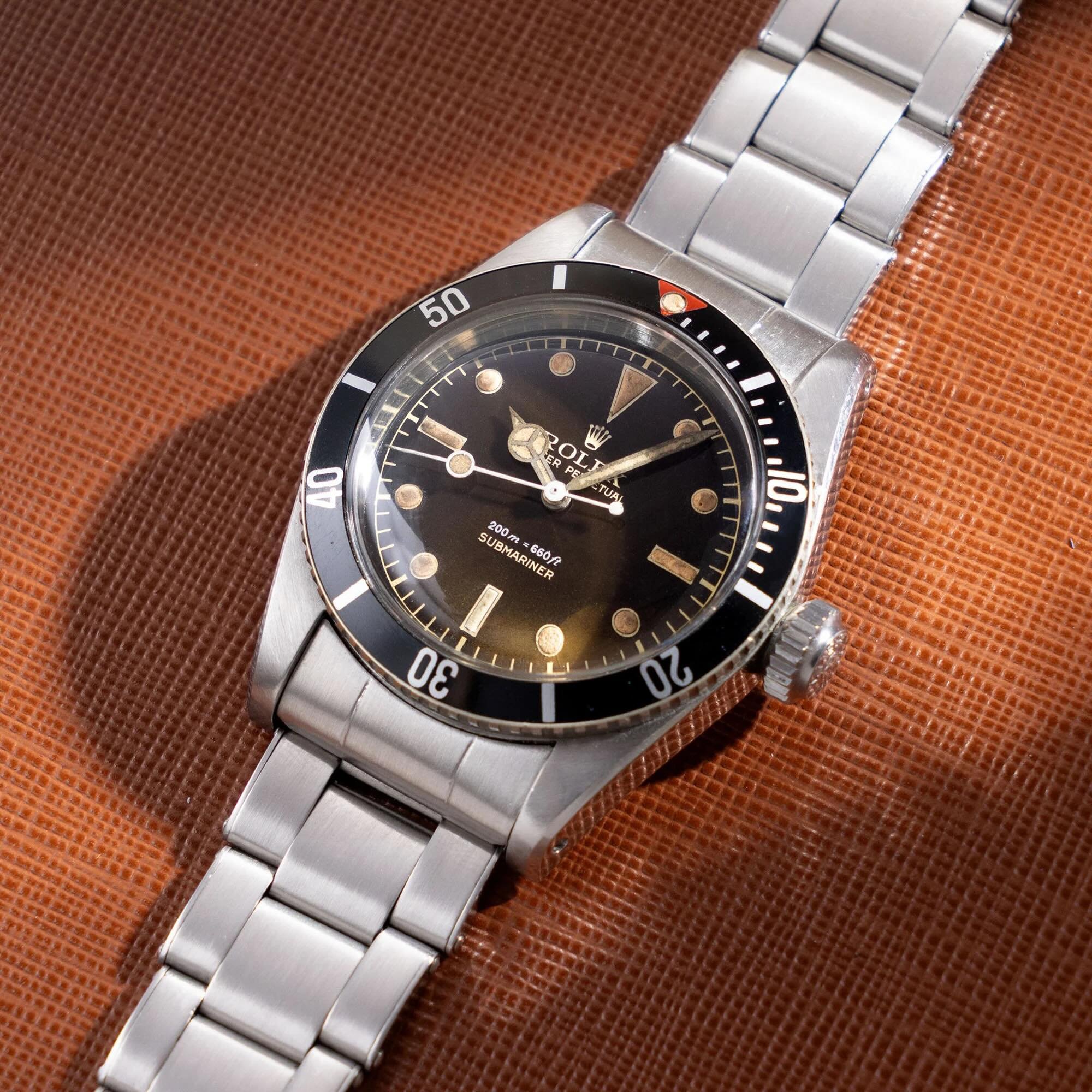 Bond watches — Rolex Submariner ref. 6538 "Big Crown" flat-lay