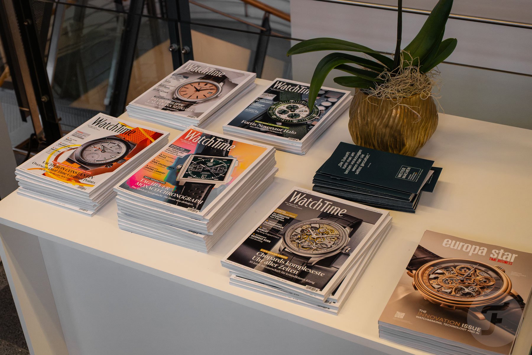 WatchTime and Europa Star magazines on table at WatchTime Düsseldorf