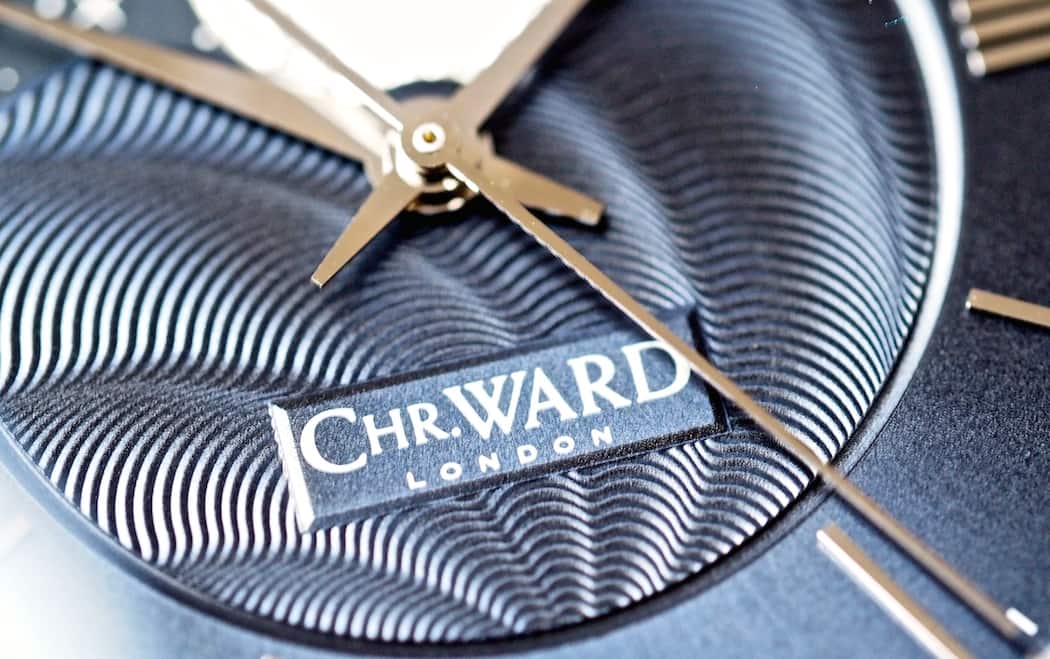 The logo on the dial of the Christopher Ward C9 Moonphase