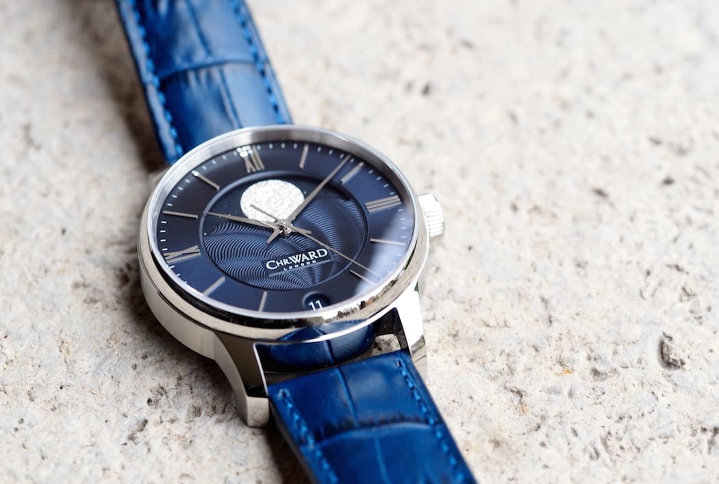 The Christopher Ward C9 Moonphase has applied Roman numeral hour indicators and matching hands