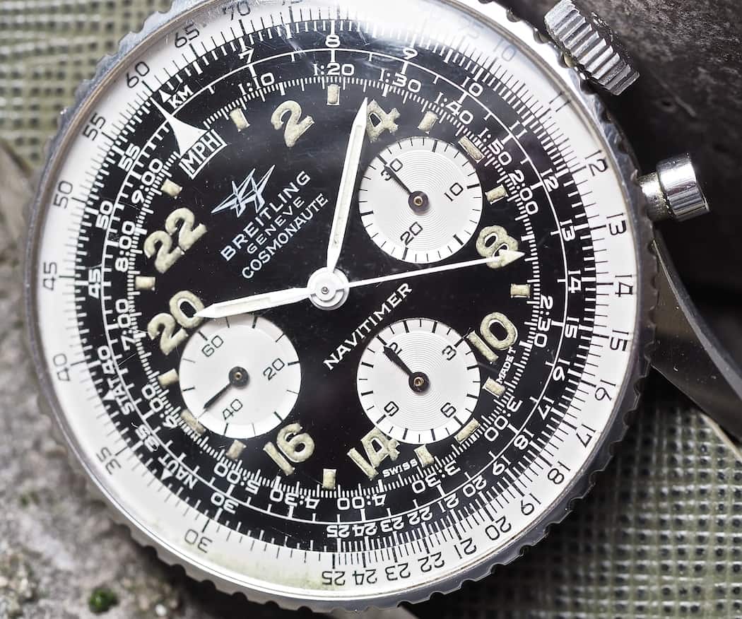 Vintage Breitling 809 Cosmonaute models often feature black, moisture-damaged lume