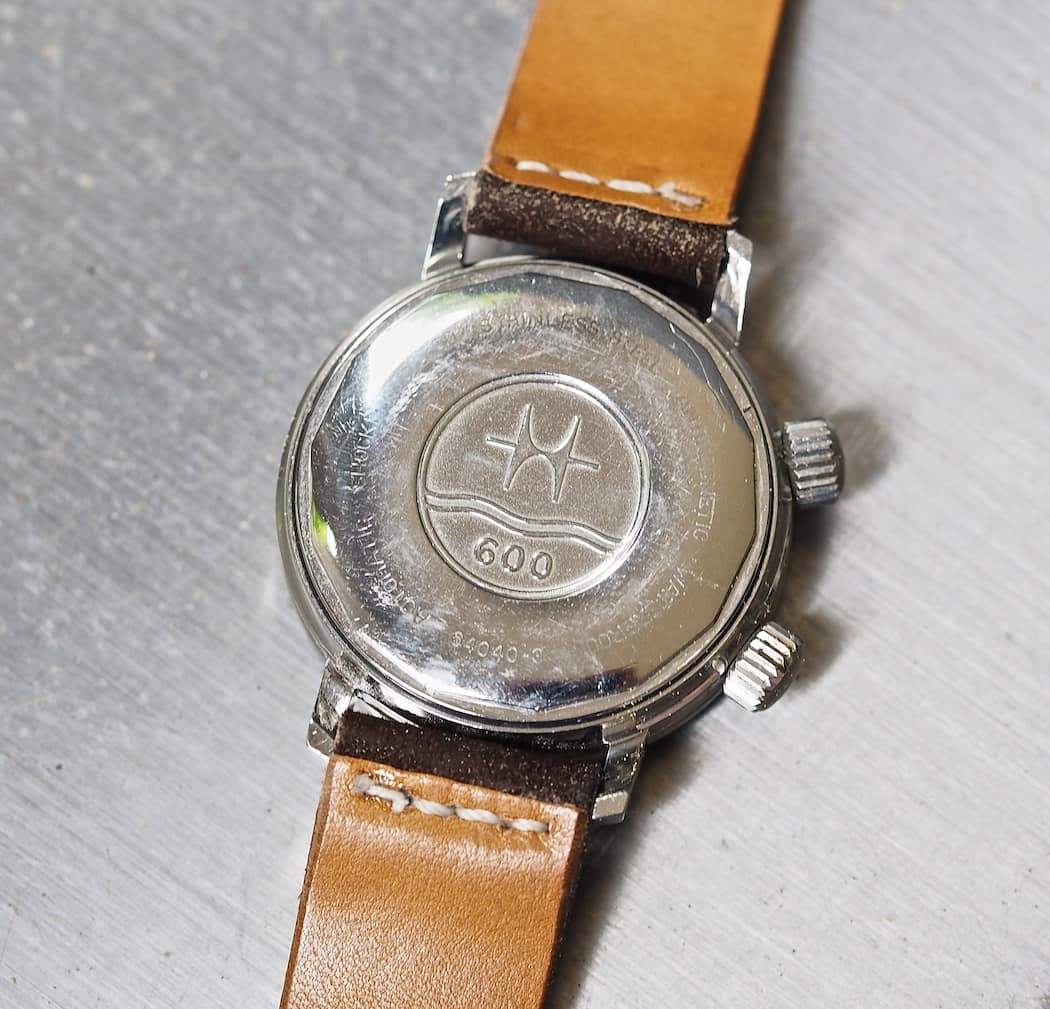The case back of the Hamilton 600 indicates water resistance of the same number in feet