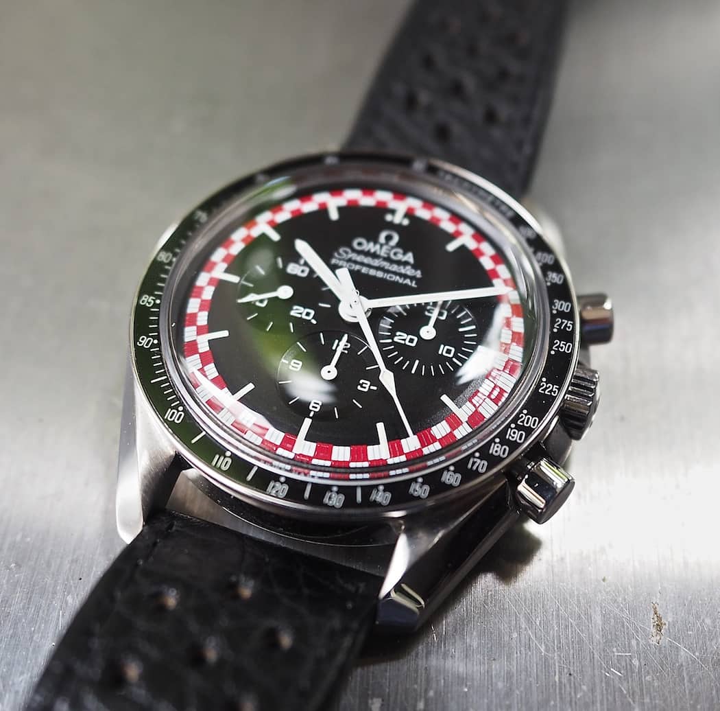 Note the gloss on the red used in the outer track of the Speedmaster TinTin