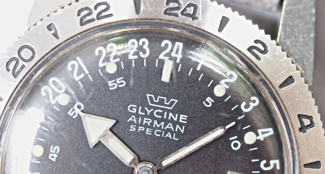 It's not easy to see on the Glycine Airman, but note the little hole betwen the 2 and 4 of "24" on the dial where the wire comes through