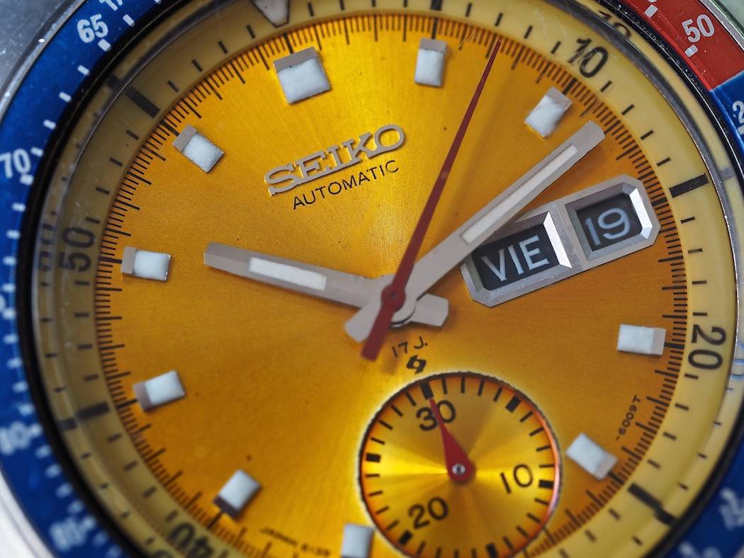 A look at the Seiko 6139 Pogue close up shows details such as the applied logo and the Suwa symbol
