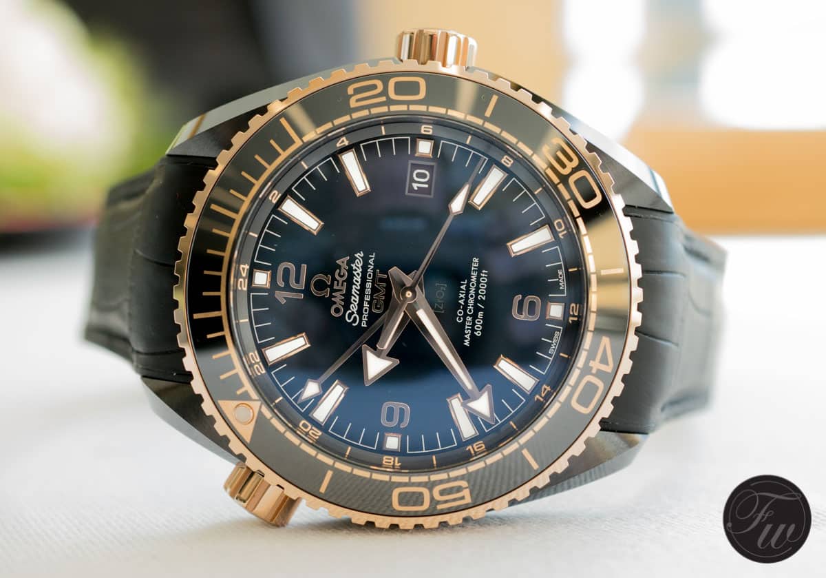 omega deep black gold